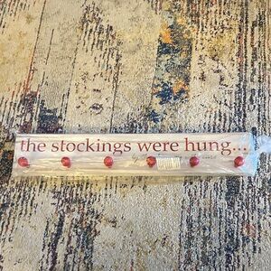 Festive Stocking Holder with Red Accents
